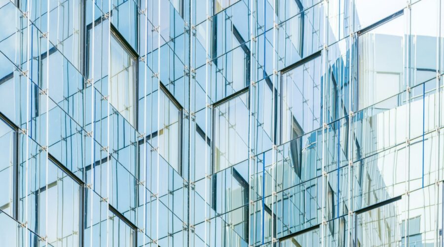 Glass facade with a repeating geometric pattern